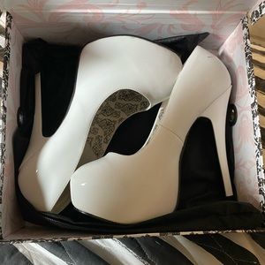 White patent leather Pleaser pumps